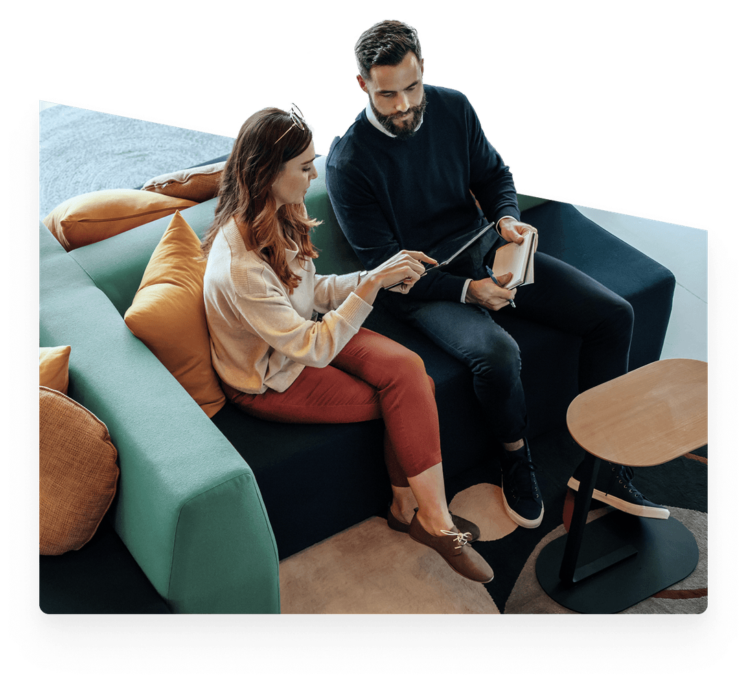 Man and Woman Comparing Notes